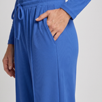 Set crop top a kalhoty s kulatým výsztergem a dlouhým mänkem