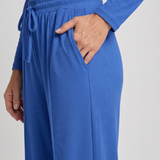 Set crop top a kalhoty s kulatým výsztergem a dlouhým mänkem