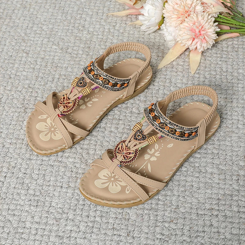 Colella | Elegant sandals decorated with flowers and a rhinestone butterfly