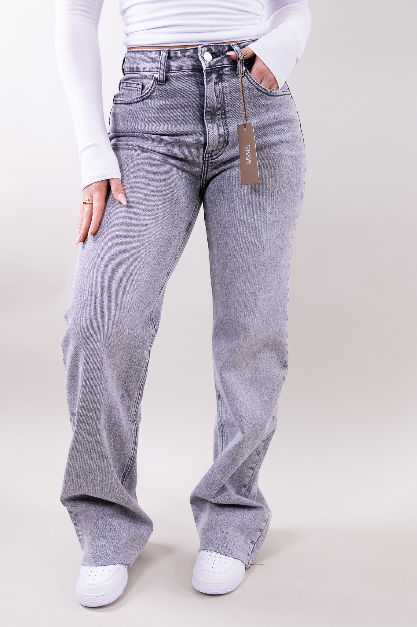 Wide leg stretch jeans with clean structured silhouette for women