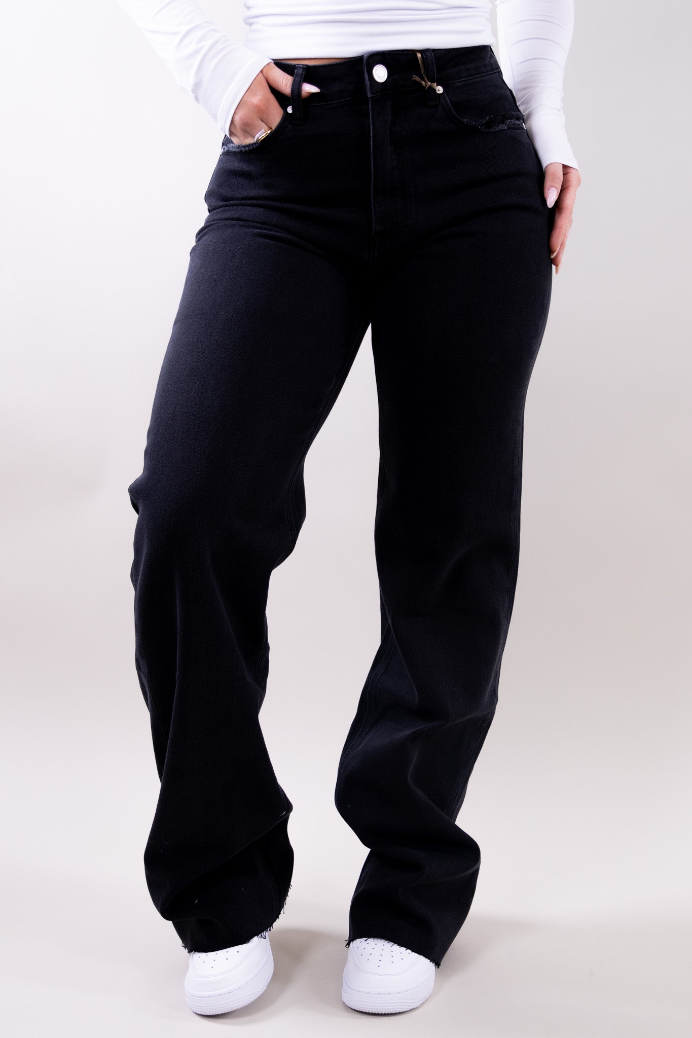 Wide leg stretch jeans with clean structured silhouette for women