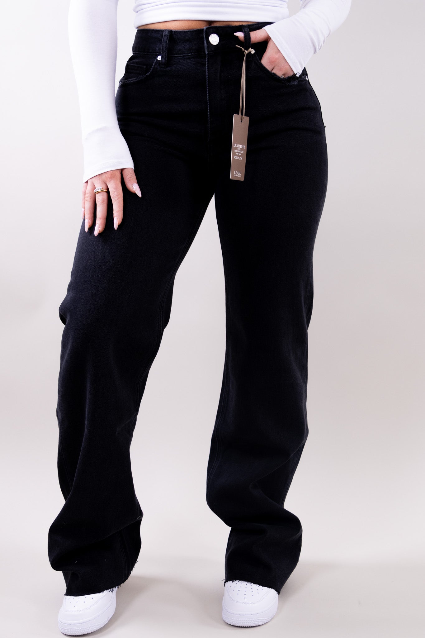 Wide leg stretch jeans with clean structured silhouette for women