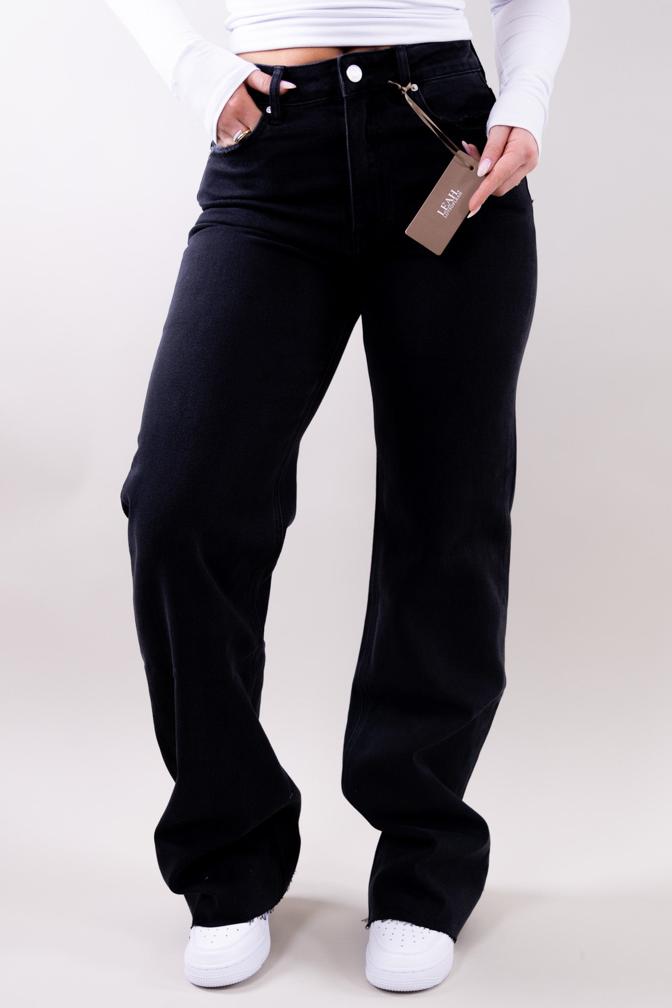 Wide leg stretch jeans with clean structured silhouette for women