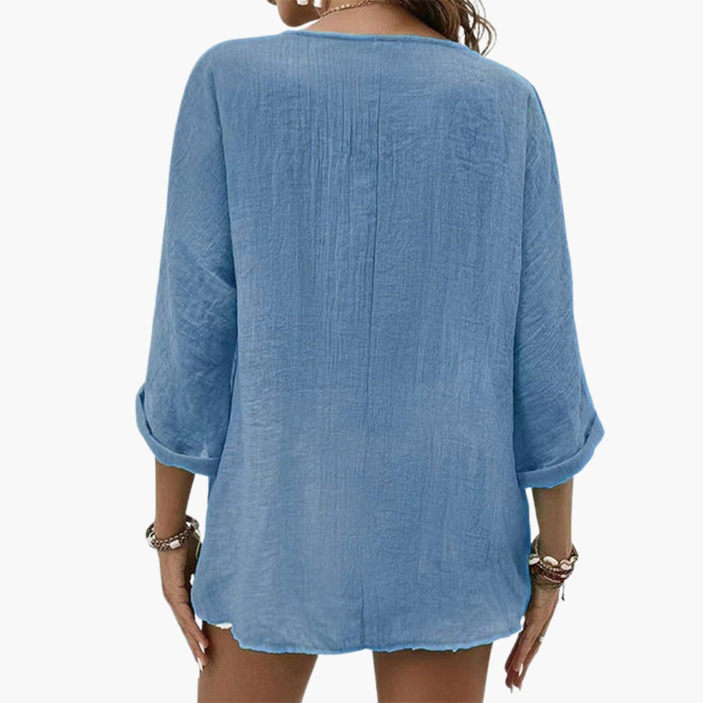 Women's V-neck shirt with buttons on the front