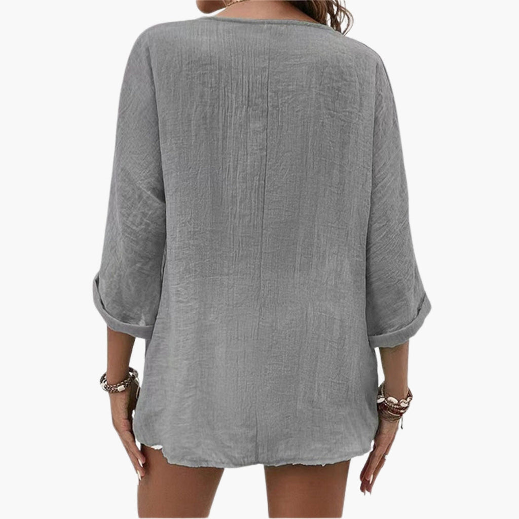 Women's V-neck shirt with buttons on the front