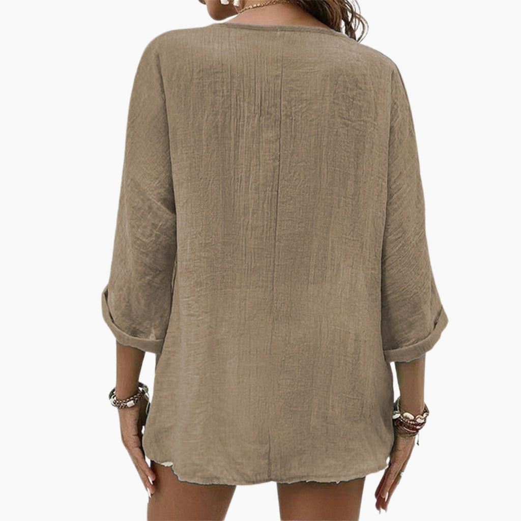 Women's V-neck shirt with buttons on the front