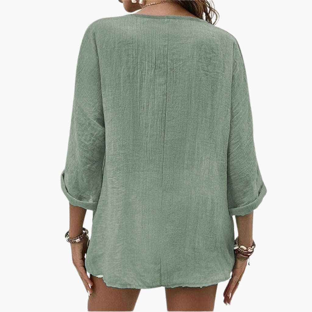 Women's V-neck shirt with buttons on the front