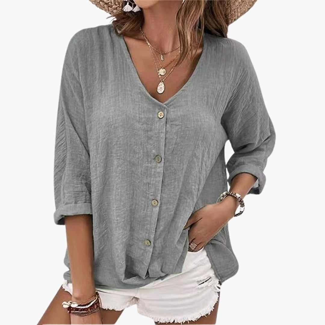Women's V-neck shirt with buttons on the front