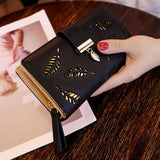 portefeuille avec feuille d'or - Tendance et pratique