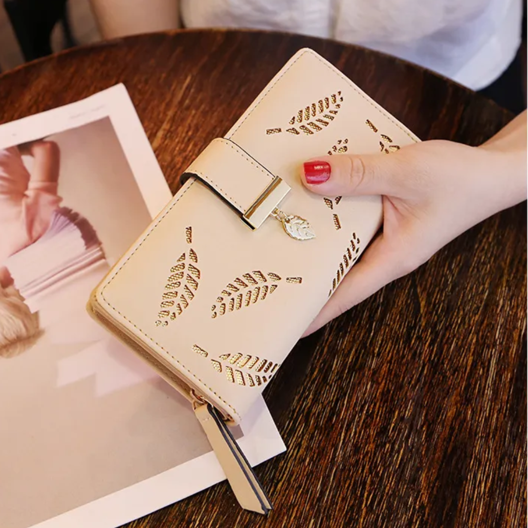 portefeuille avec feuille d'or - Tendance et pratique