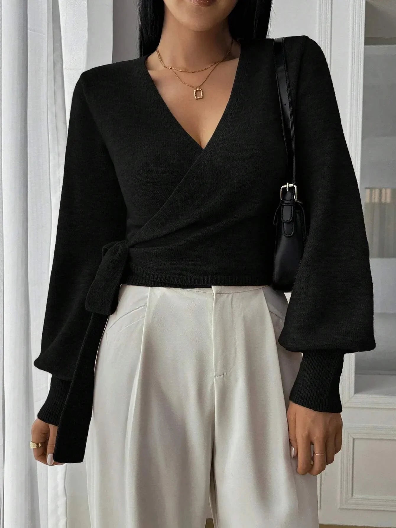 Women's wrap sweater with tie belt