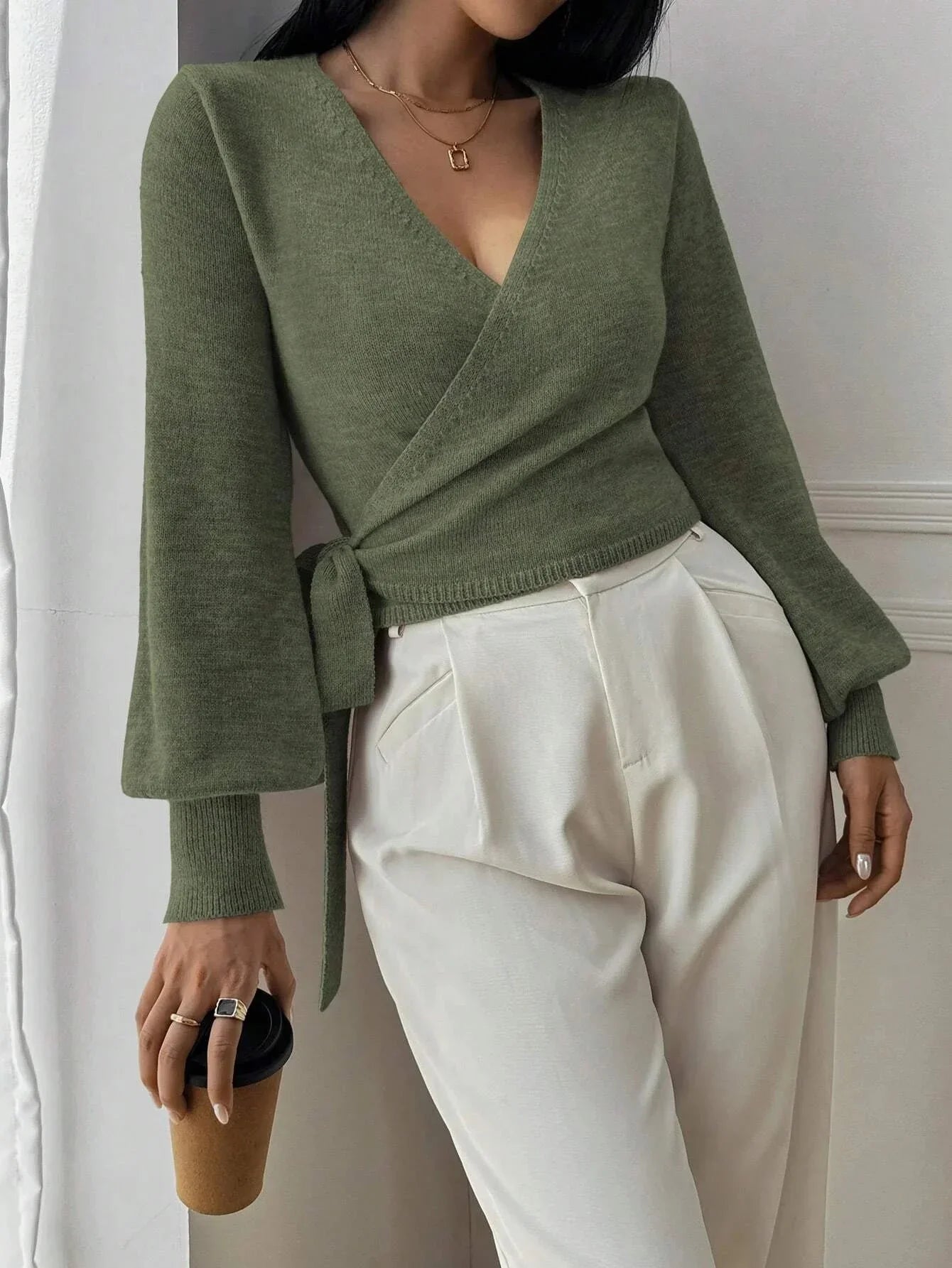 Women's wrap sweater with tie belt