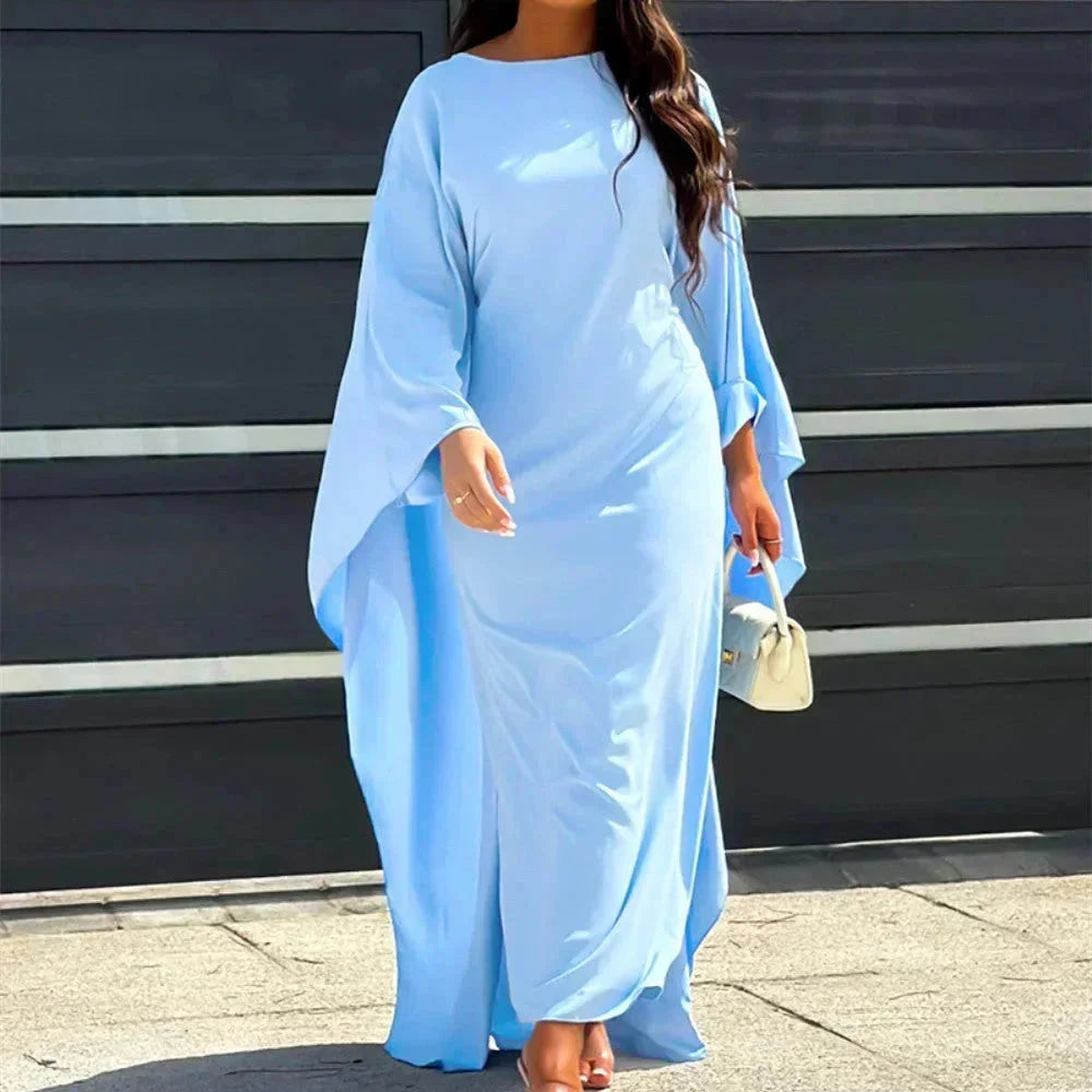Women's long dress with flowing draped long sleeves