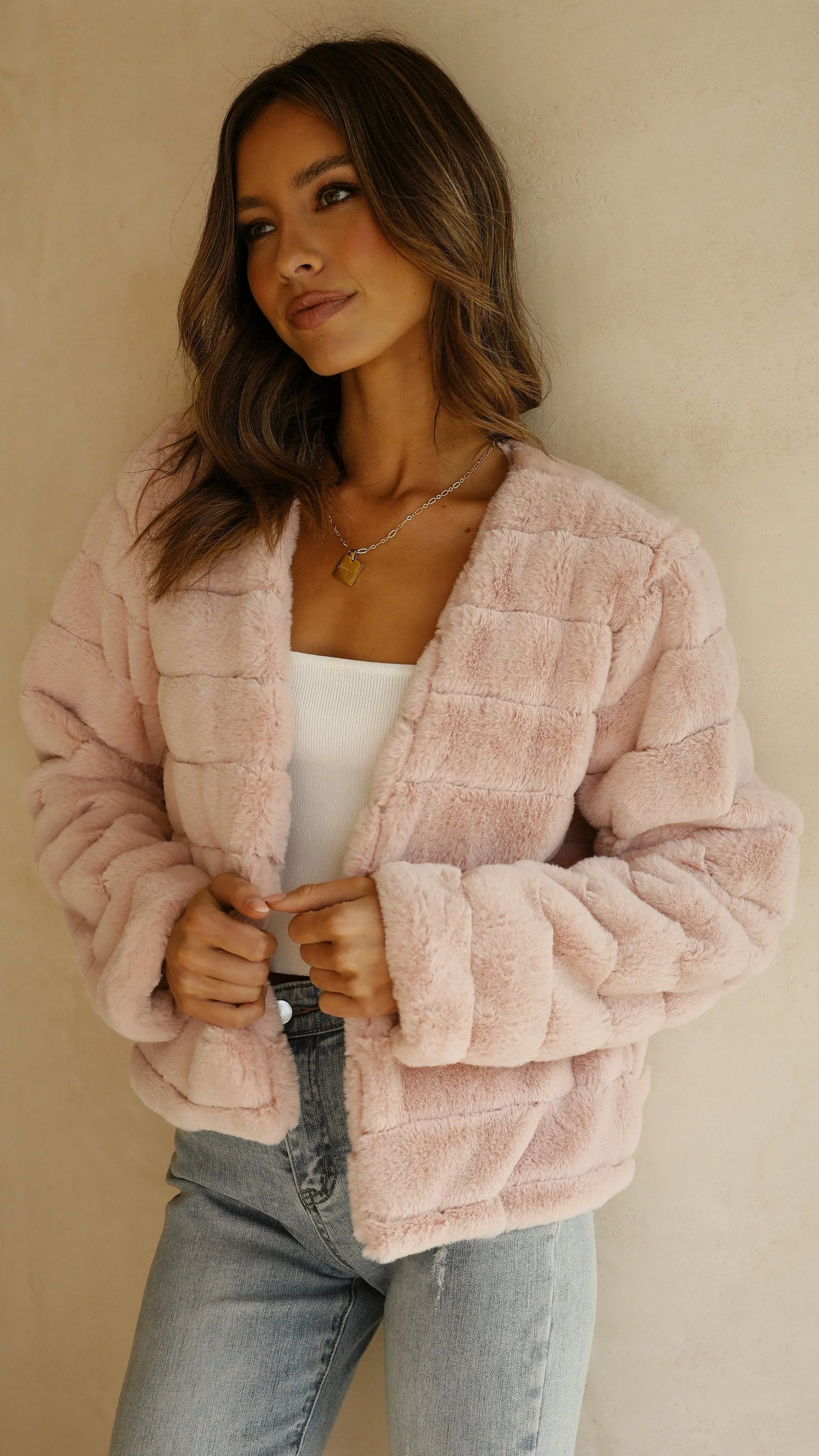 Women's short faux fur jacket with open collar