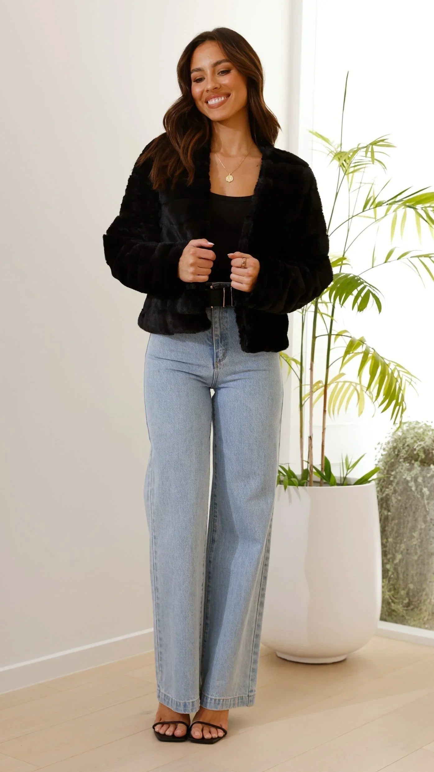 Women's short faux fur jacket with open collar