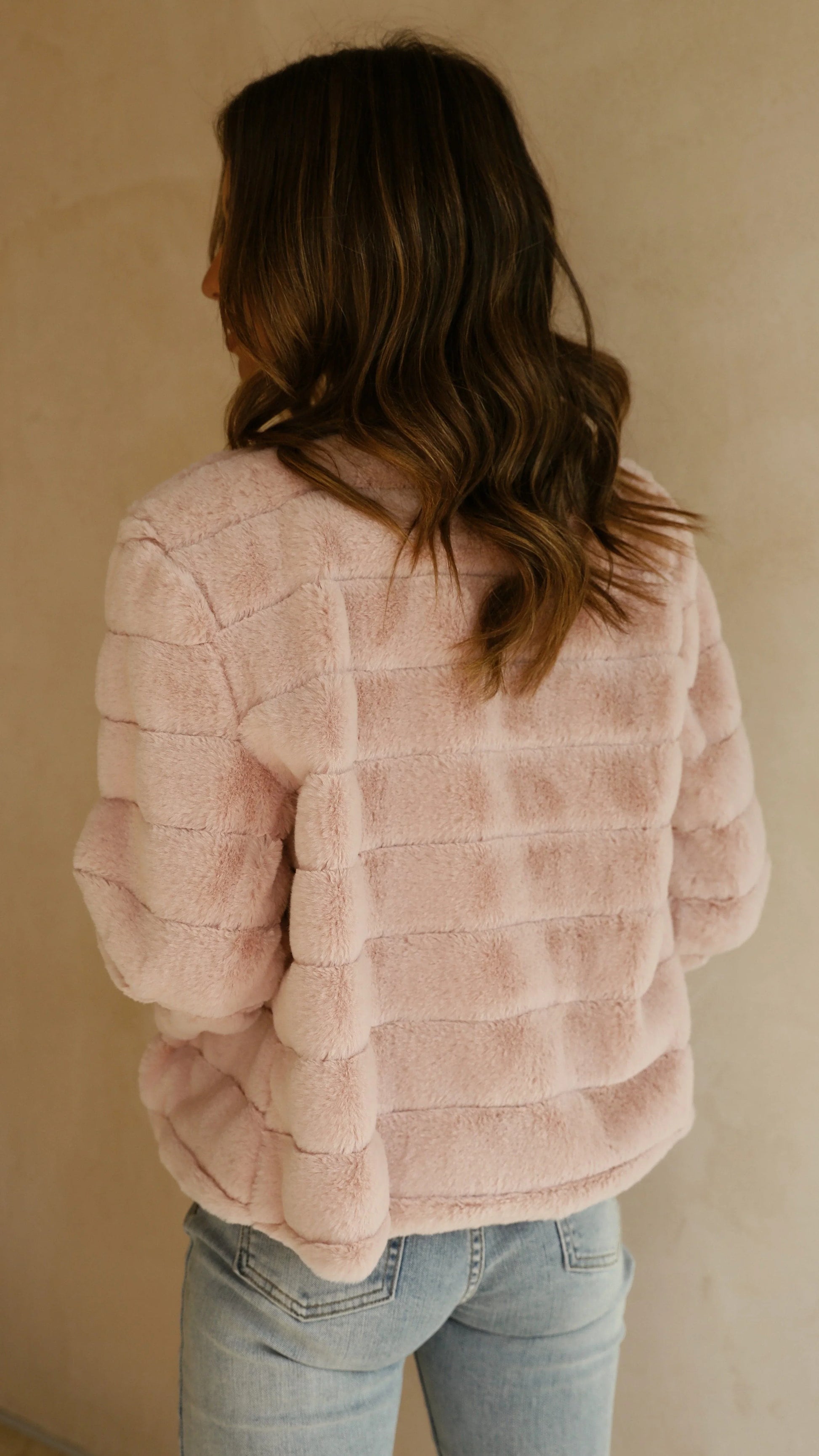 Women's short faux fur jacket with open collar
